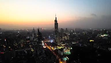 4K航拍南京地标紫峰大厦鼓楼广场夜景视频的预览图
